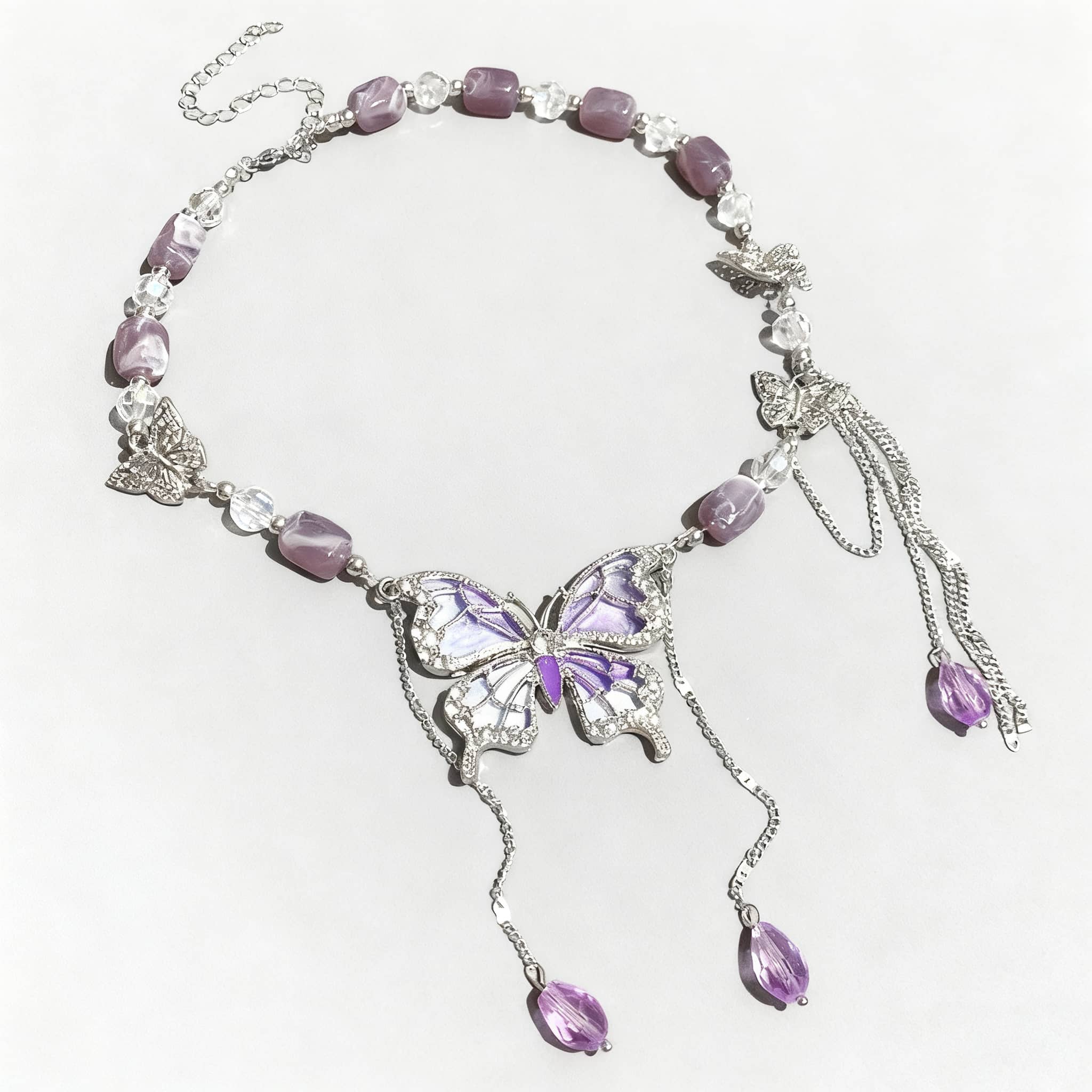 Purple butterfly necklace designed with silver accents and colorful gemstones for a vibrant look