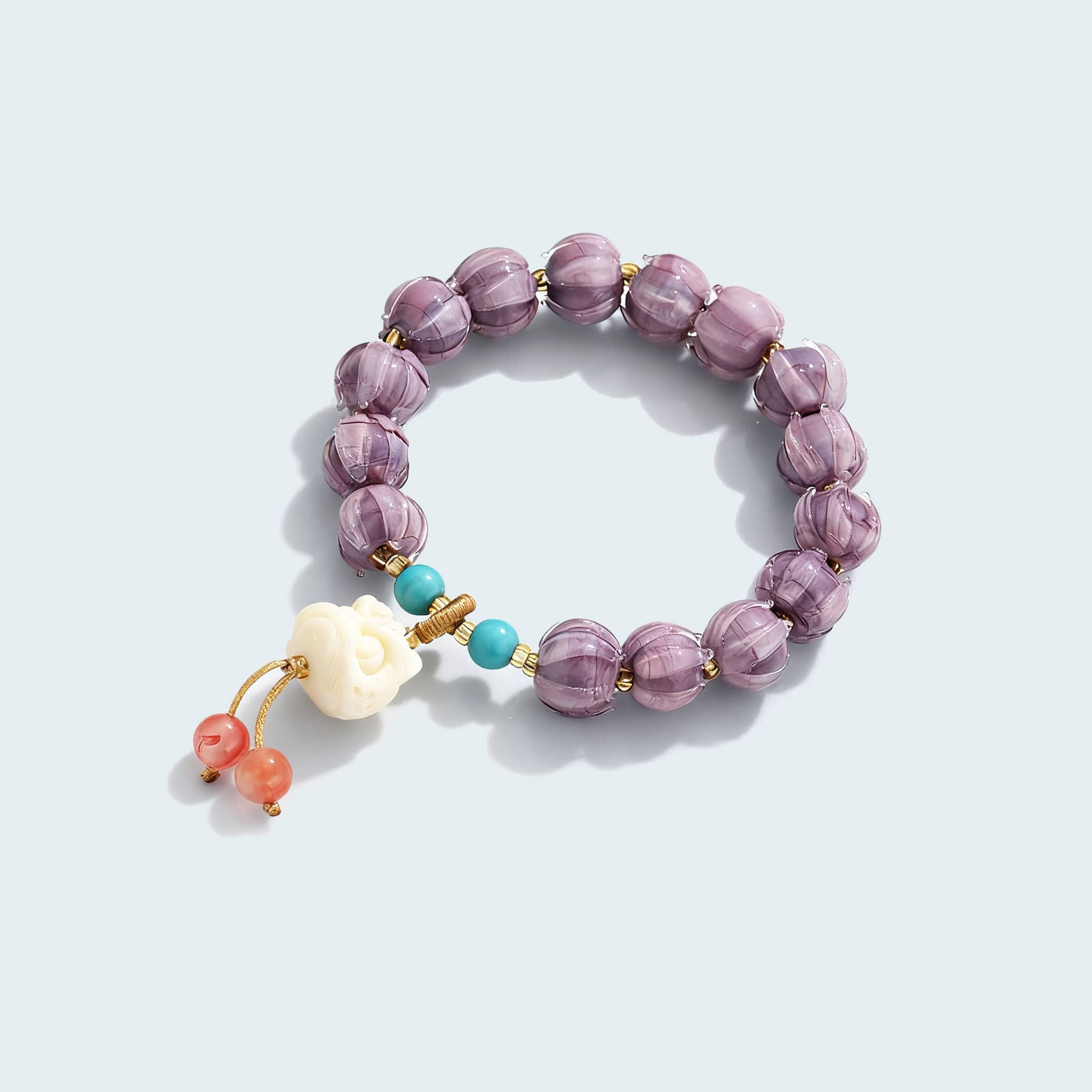 Purple gemstone self-care bracelet with unique colors and calming design for anxiety relief