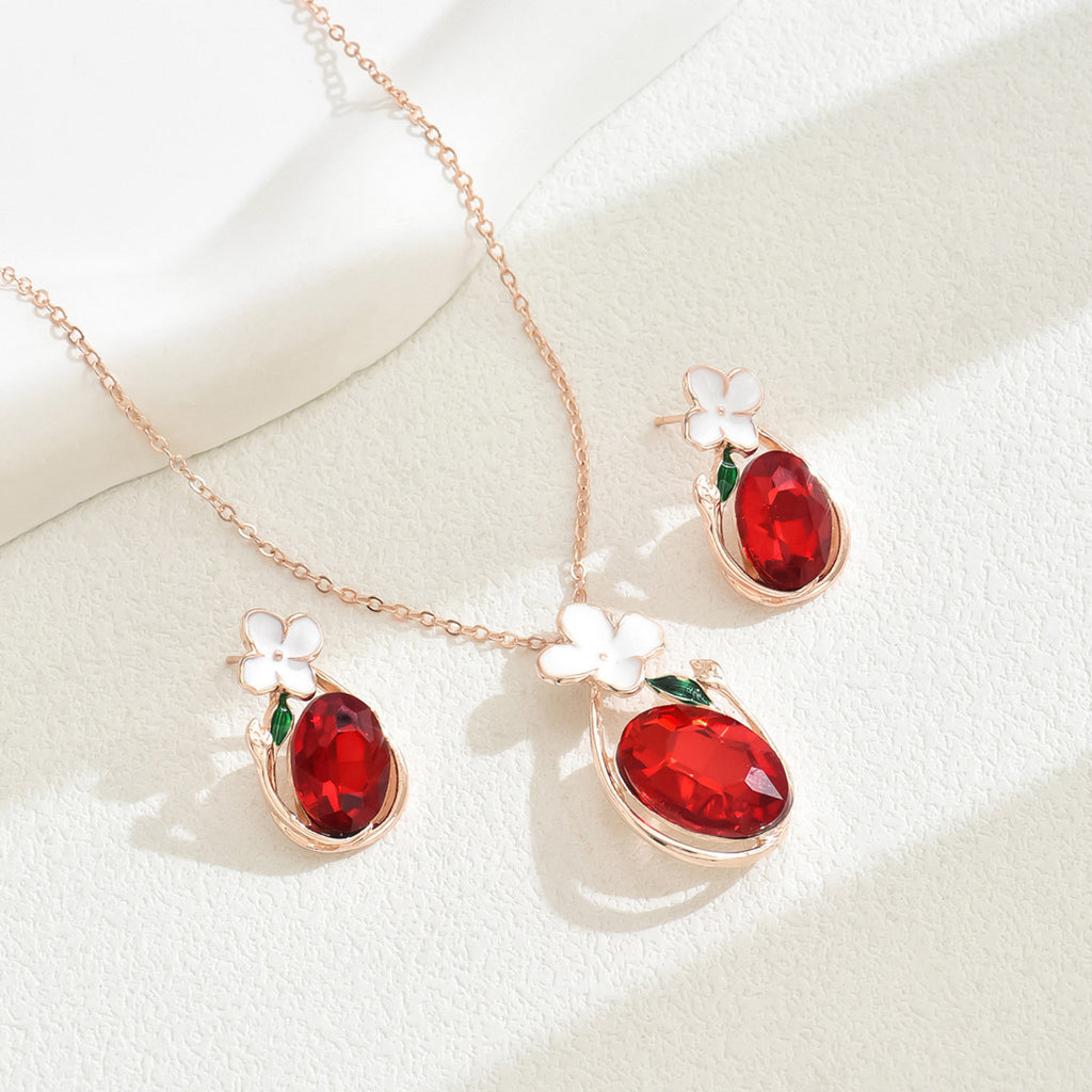 Red oval gemstone necklace with white flower accents and matching earrings red diamond necklace and earrings set