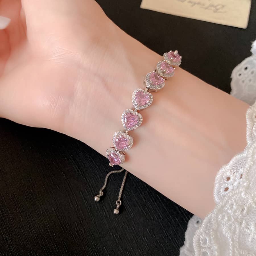 Elegant Joy Bracelet from 5 Senses featuring pink heart-shaped stones, a unique self-love jewelry gift