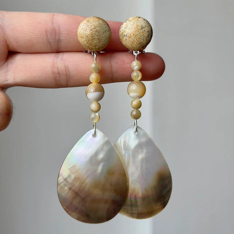 Elegant shell drop earrings for self care featuring natural stones and a delicate design