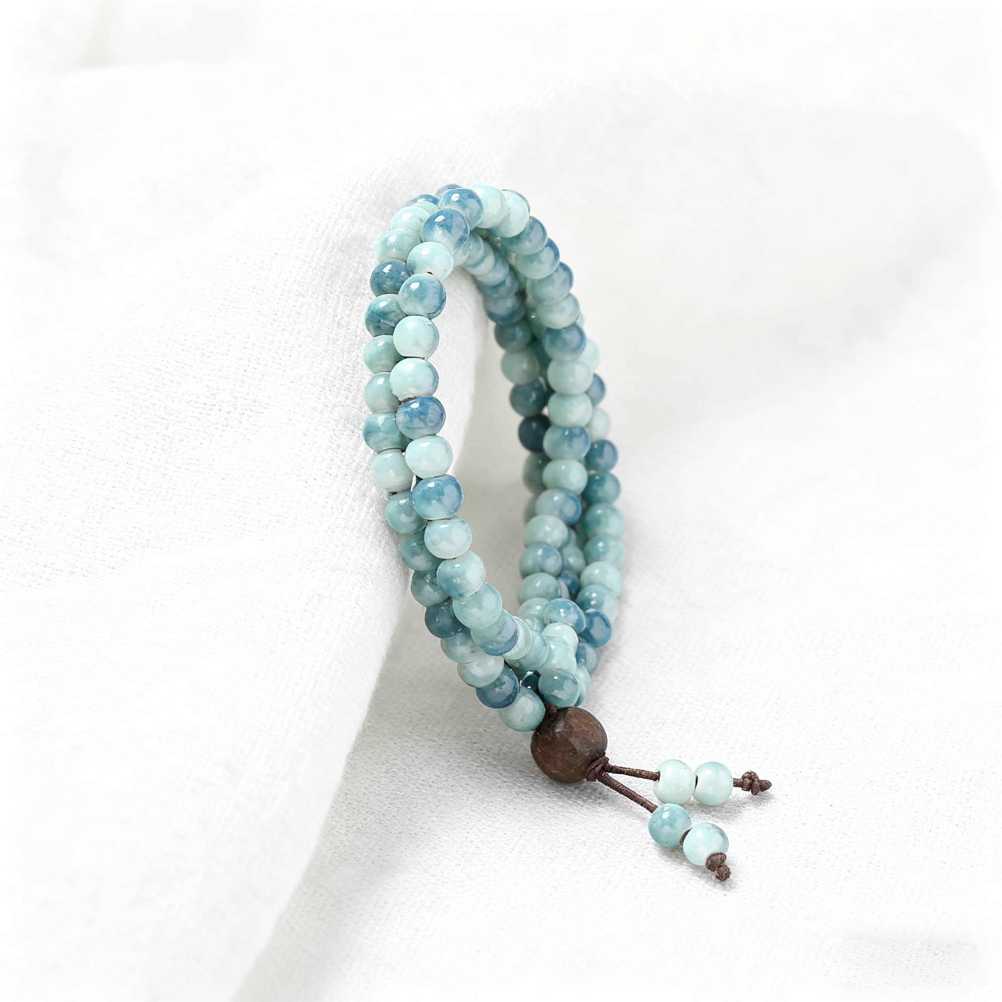 Sky blue ceramic beaded bracelet with natural wood accent for stylish everyday wear