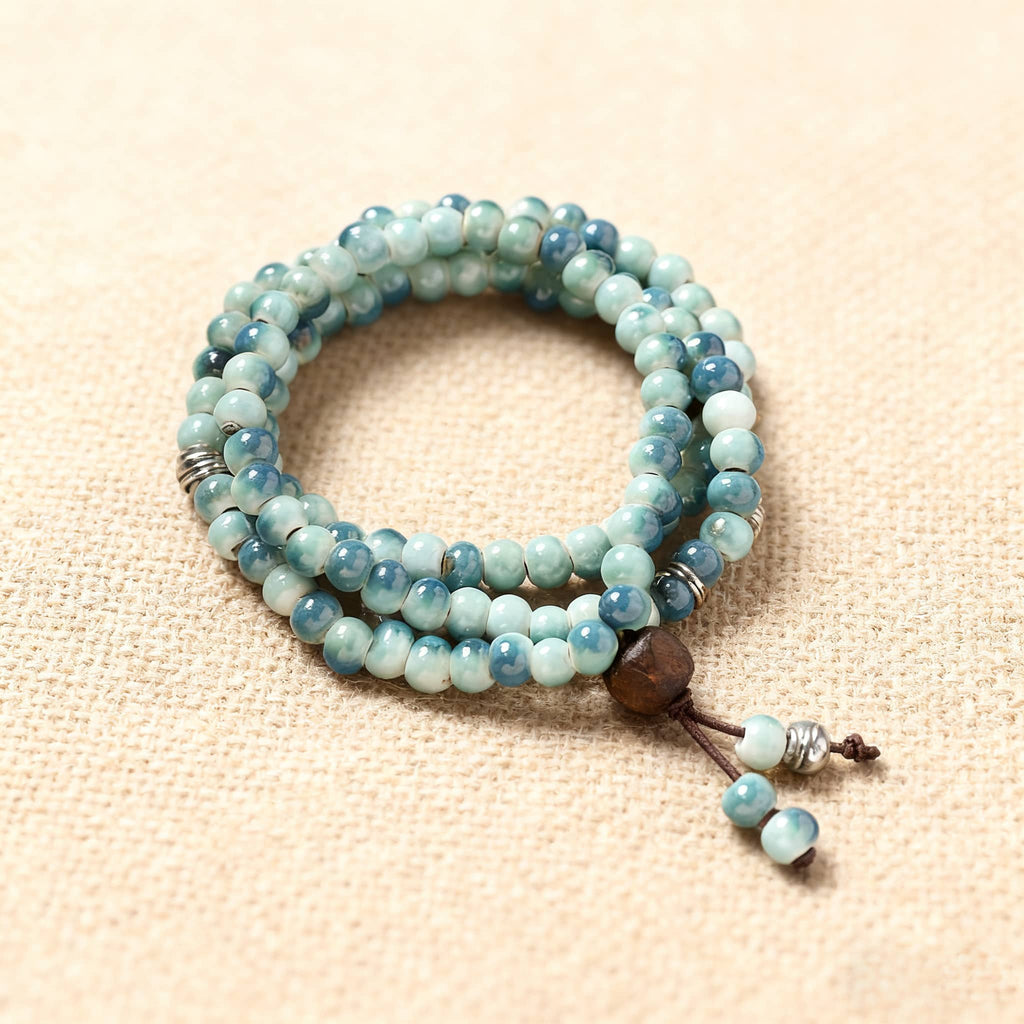 Sky blue ceramic beaded bracelet with wooden accents and a multi-strand design for a stylish look
