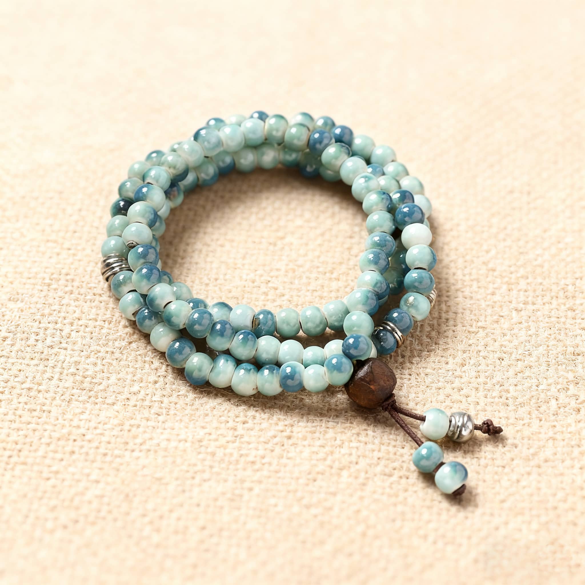 Sky blue ceramic beaded bracelet with wooden accents and a multi-strand design for a stylish look
