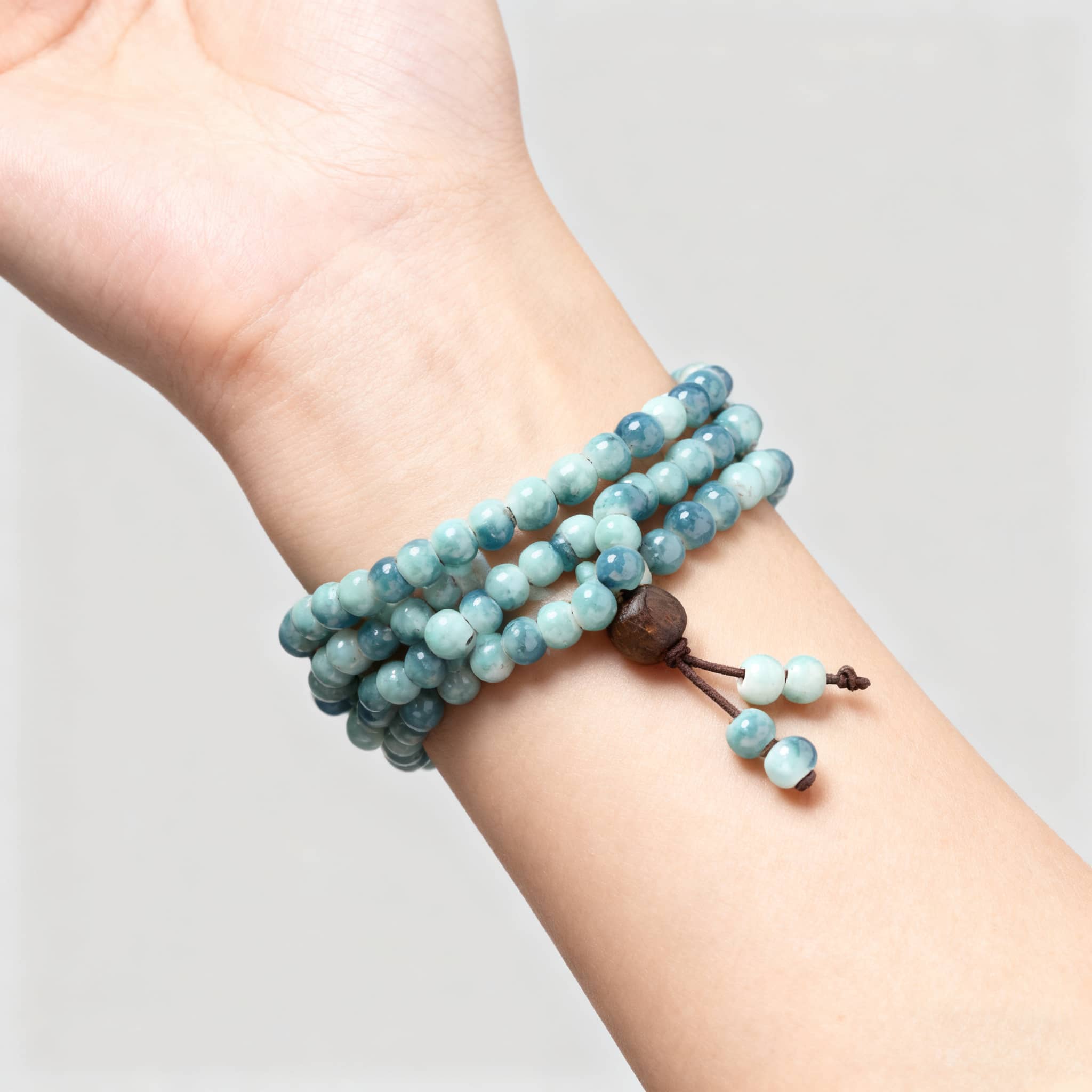 Sky blue ceramic beaded bracelet featuring a beautiful design and adjustable closure for a comfortable fit