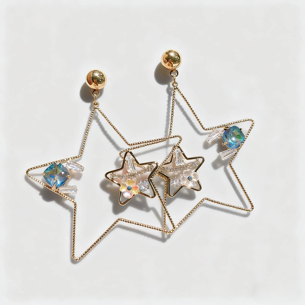 Elegant starburst stud earrings with shimmering crystals in a gold design