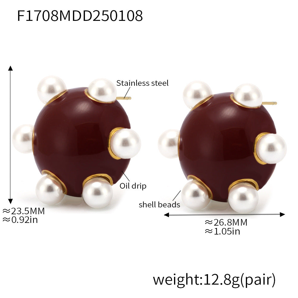Angry earrings with burgundy base and pearl accents statement gold stud earrings