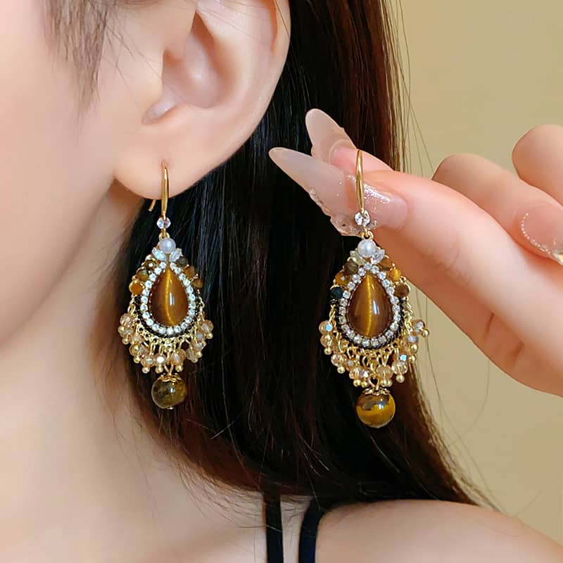 Stunning tiger's eye anxiety relief earrings with elegant design and sparkling accents