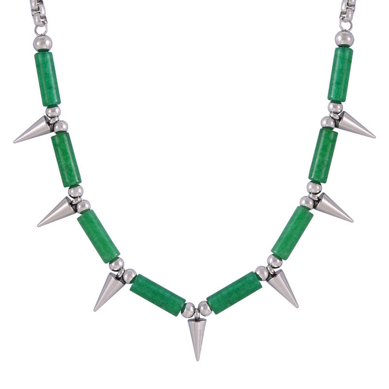 Anxious necklace featuring green cylindrical beads and silver spikes in a steel point necklace design