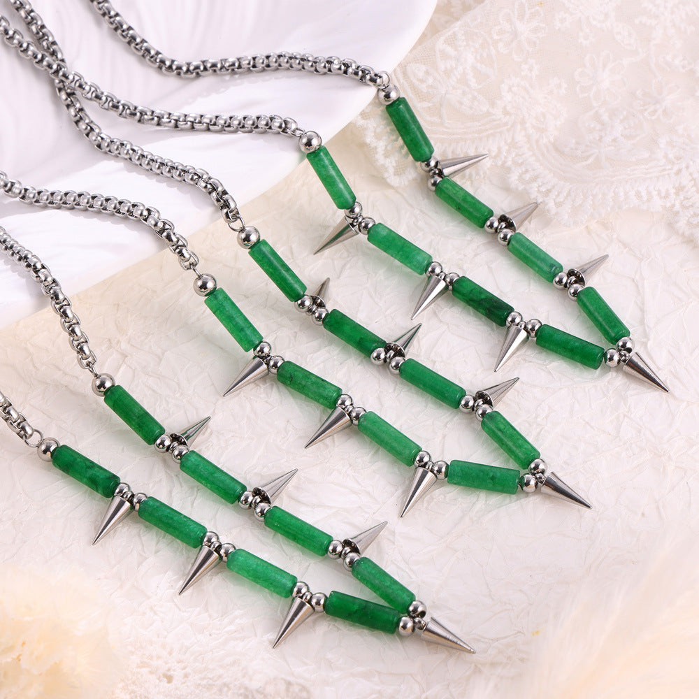 Anxious steel point necklace with green beads and silver spikes on silver chain