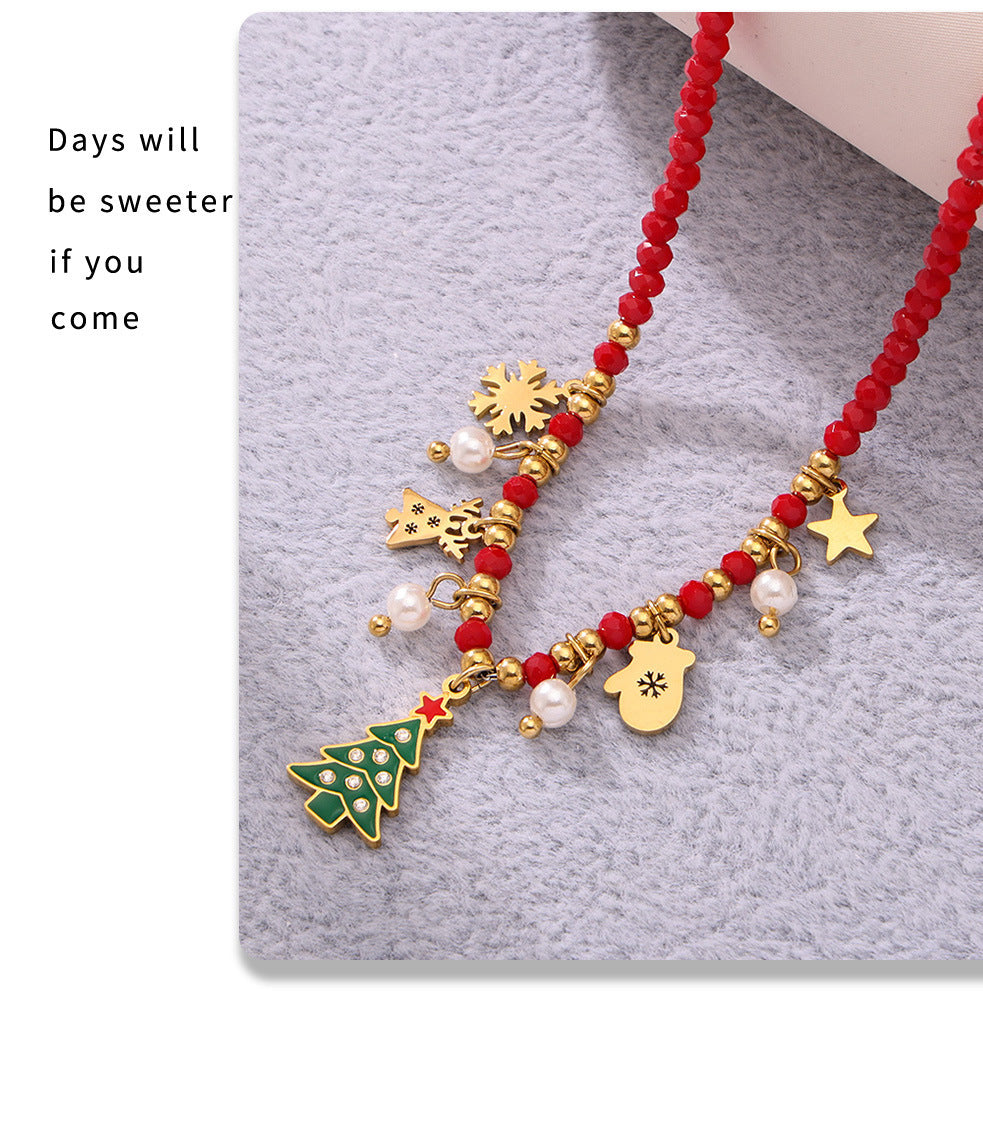 Joy necklace with gold Christmas tree necklace pendant and red beads with festive charms