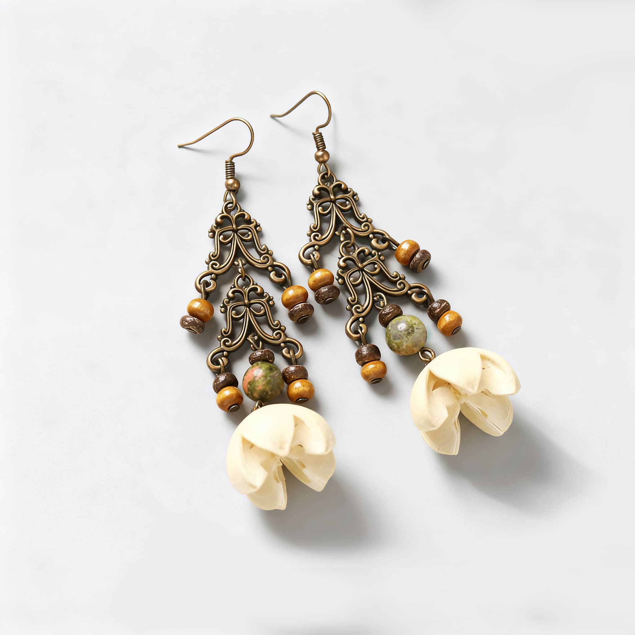 Unique vintage cut-out metal earrings with floral design and natural stones for a stylish look