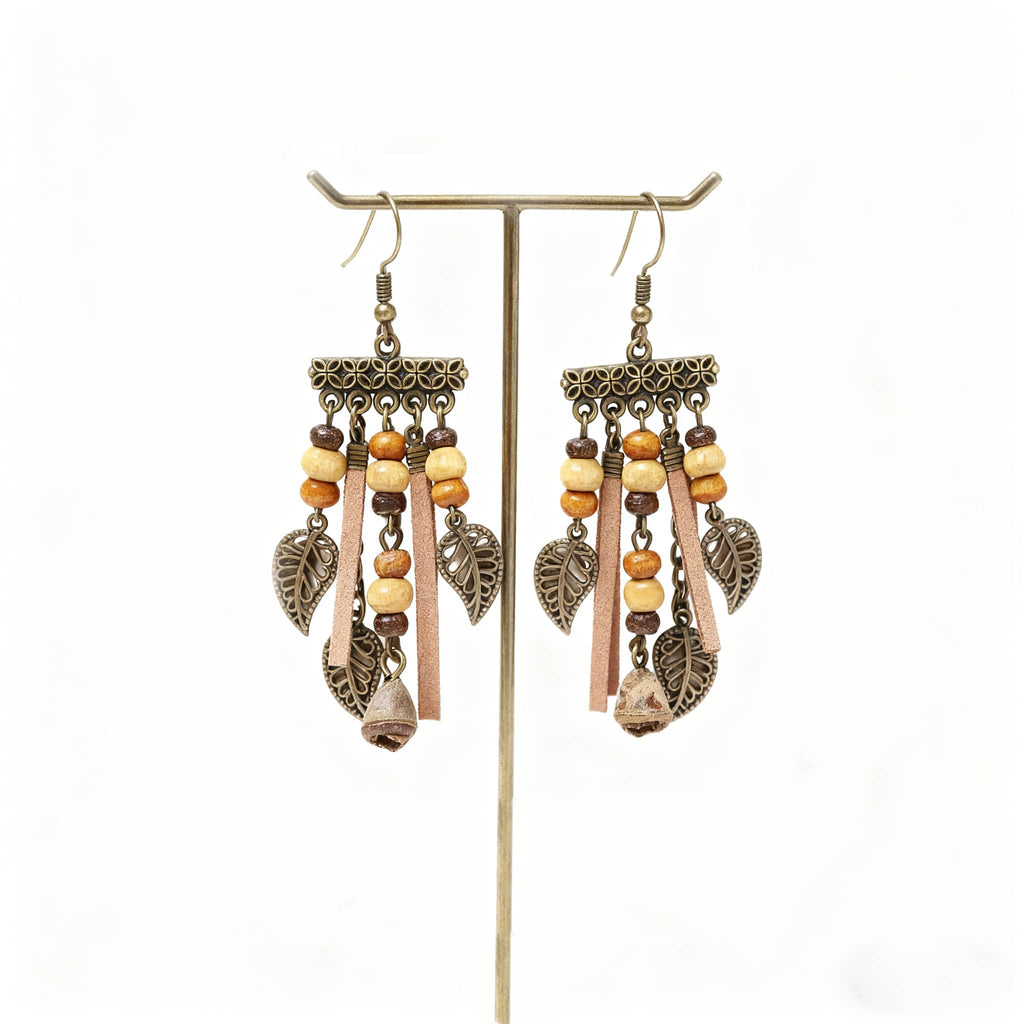 Vintage leaf tassel earrings with brown beads and metal leaf details for a stylish look