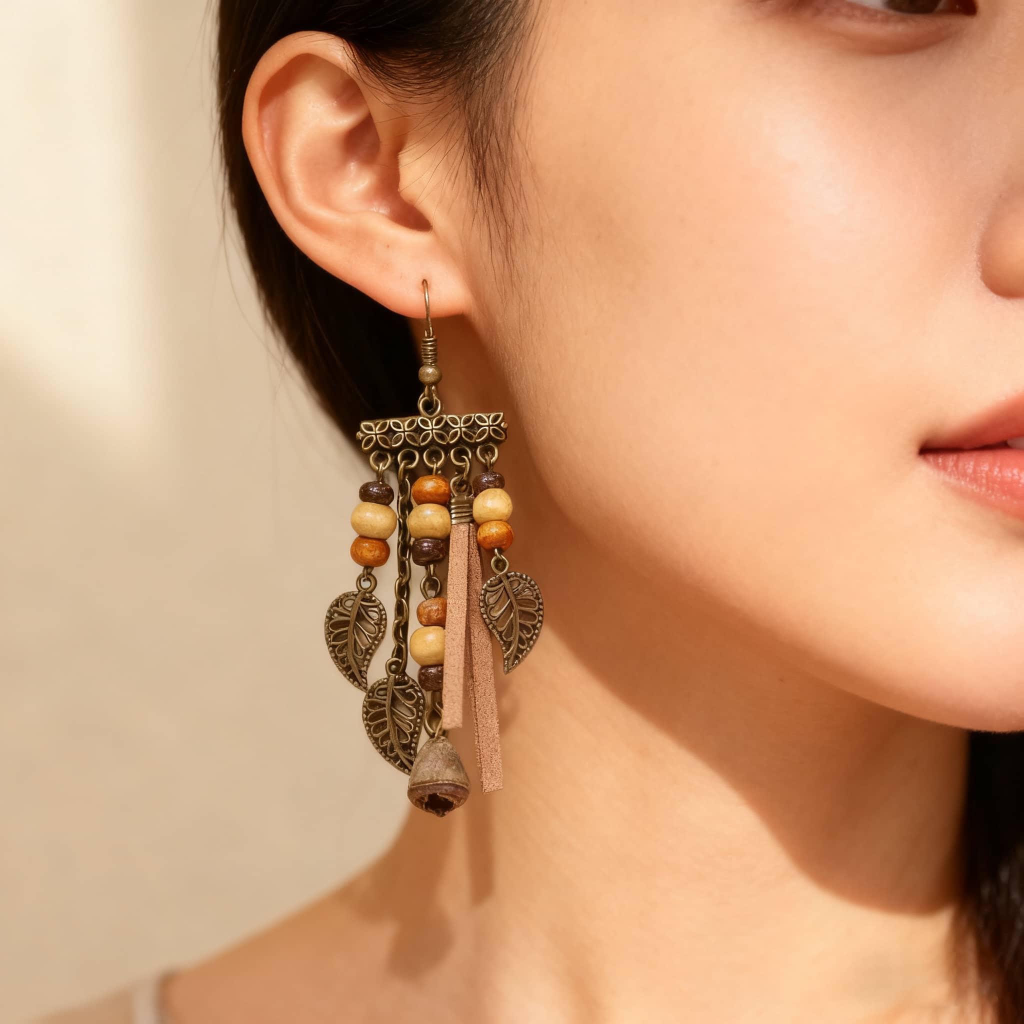 Vintage leaf tassel earrings featuring colorful beads and elegant metal details for a stylish look