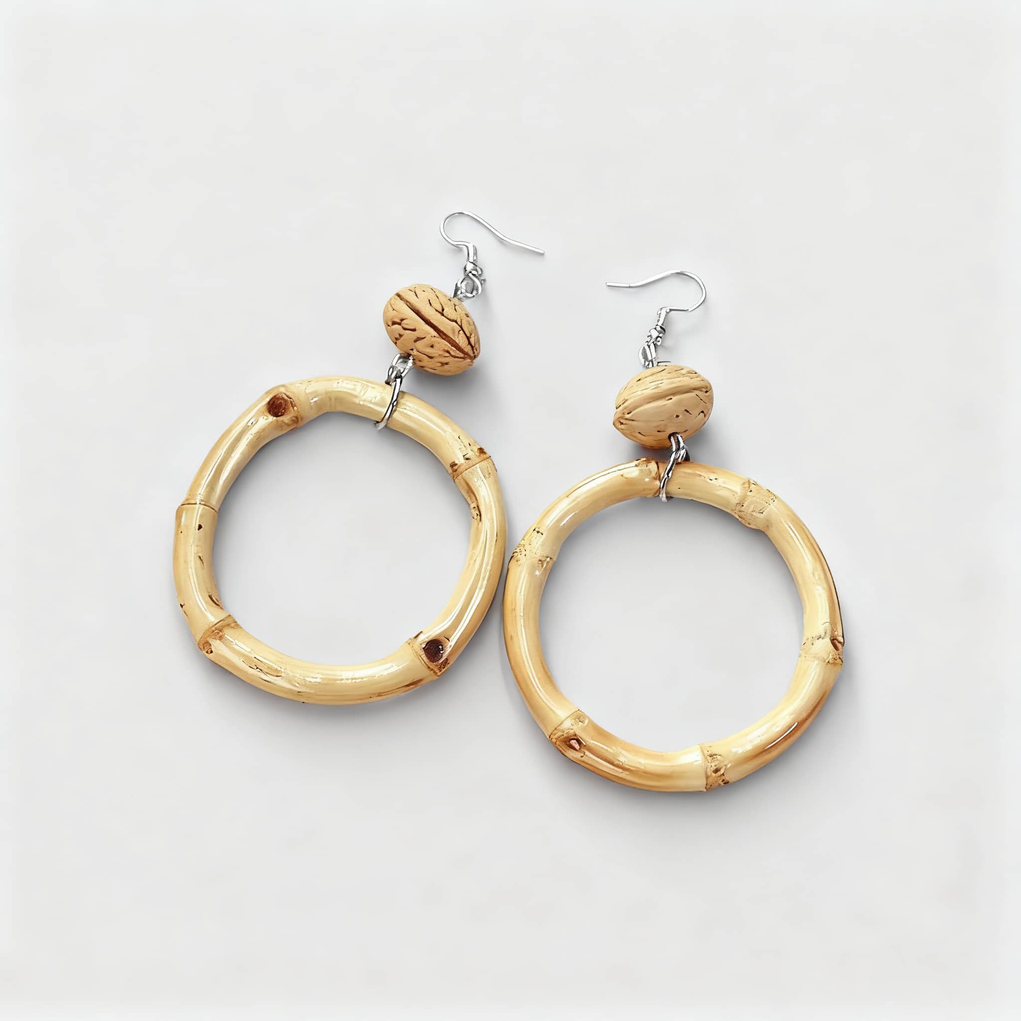 Stylish walnut and bamboo earrings featuring a lightweight hoop design for an elegant look