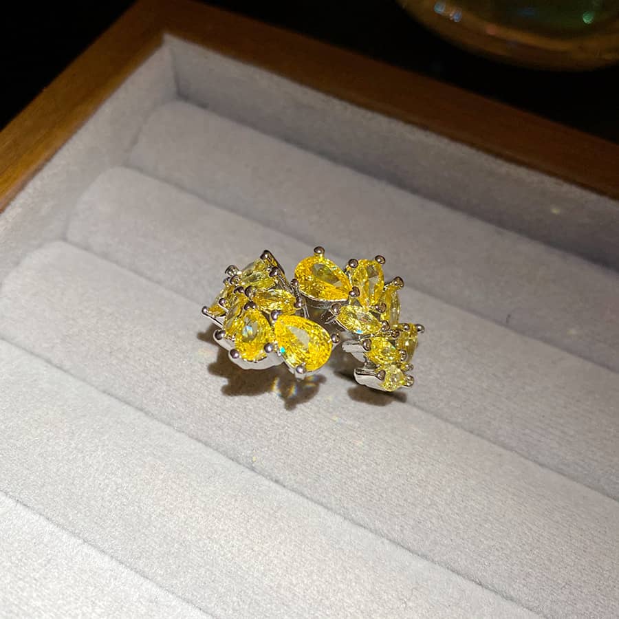 Stunning yellow zircon wheat ring with brilliant yellow gemstones set in silver