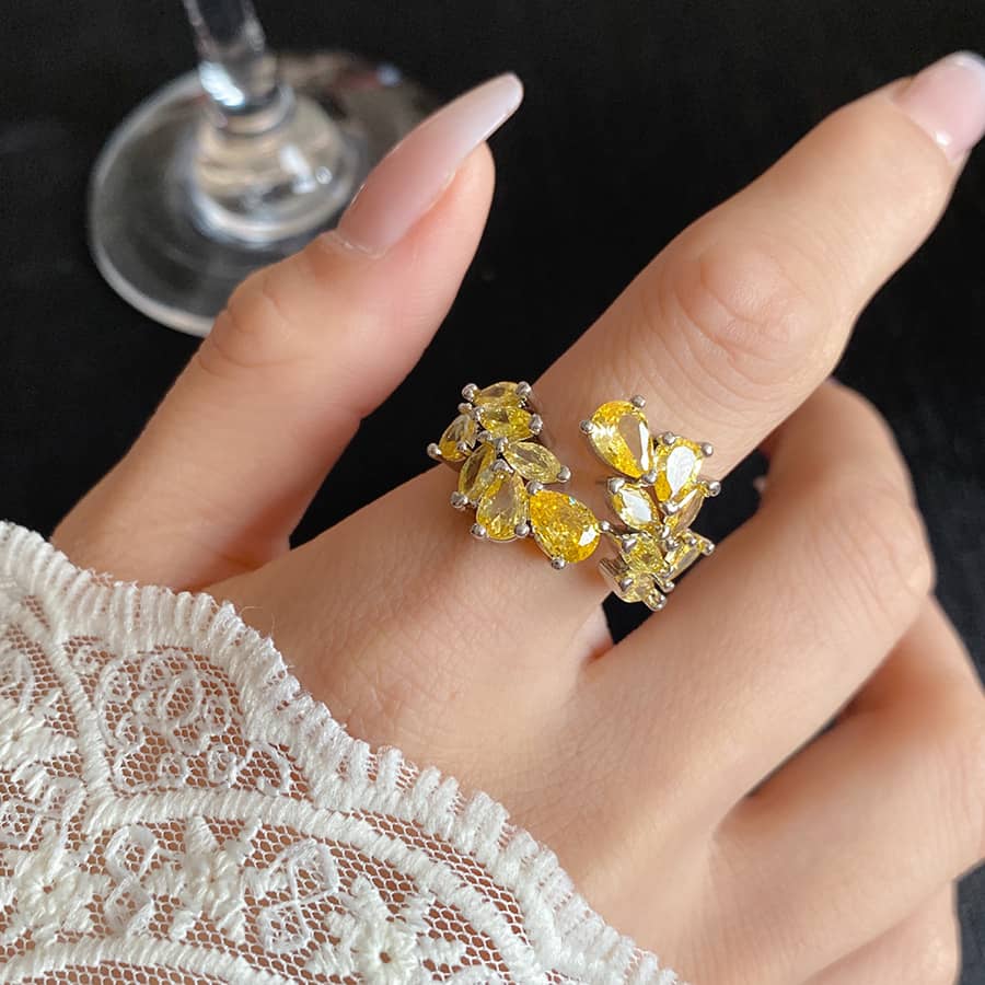 Elegant yellow zircon wheat ring from 5 Senses featuring a unique design with sparkling gems